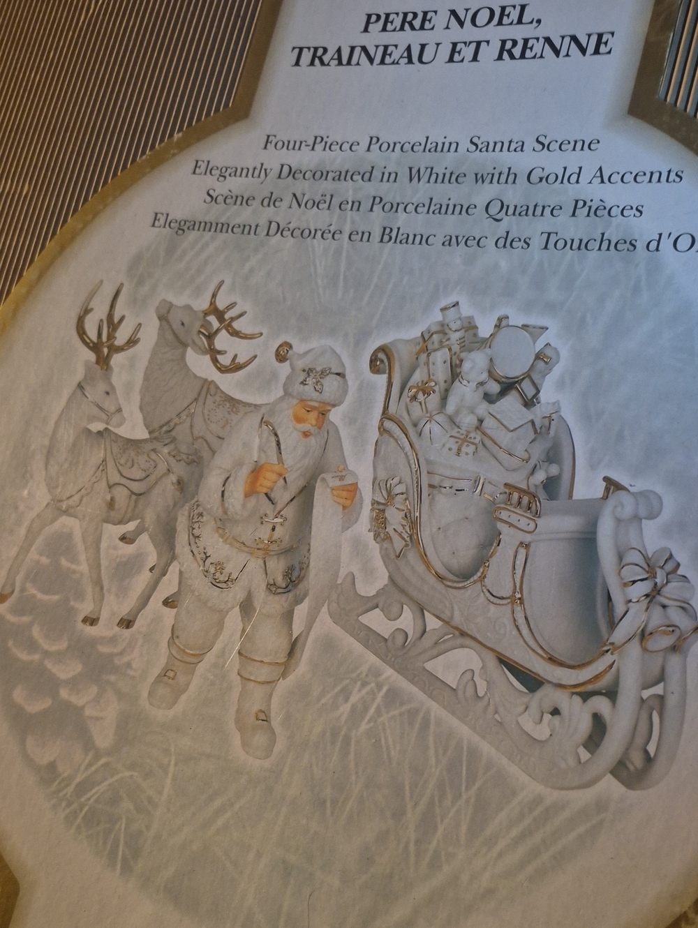 Porcelain Holiday Santa Scene in White and Gold